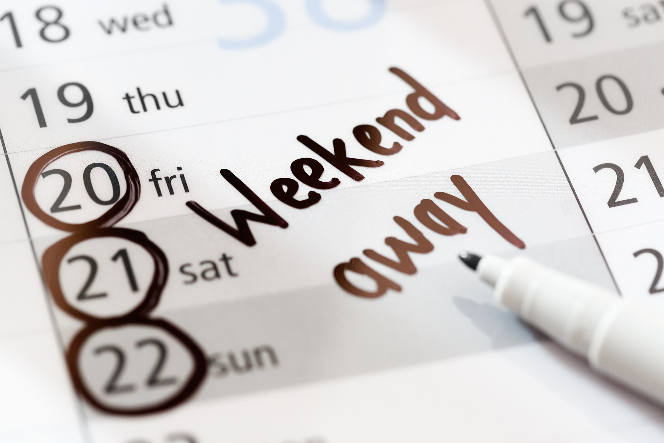 Weekend vacation away marked on non-specific calendar